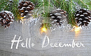 Hello December.Christmas decoration on old wooden background.Winter holidays concept.