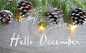 Hello December.Christmas decoration on old wooden background.Winter holidays concept. photo