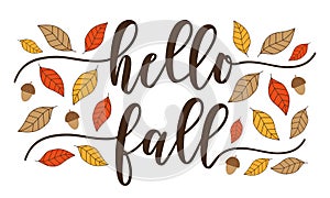 Hello Fall - handwriting greeting with autumn leaves and acorn.