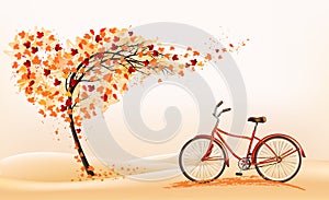 Hello a gold autumn. Autumn landscape with autumn colorful leaves on the  tree and bike in a park