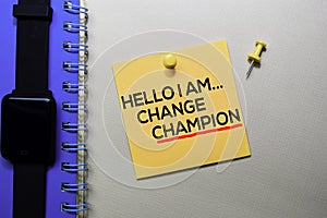 Hello I am Change Champion text on sticky notes isolated on office desk