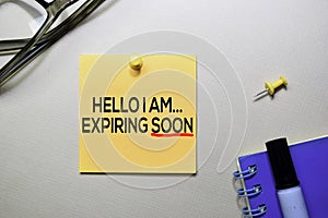 Hello I am Expiring Soon text on sticky notes isolated on office desk photo