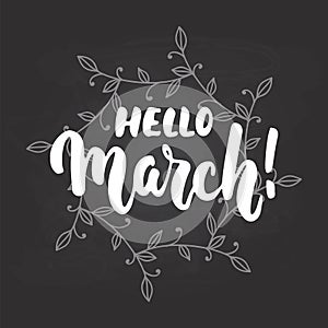Hello,March - hand drawn lettering phrase for first month of spring on the black background with wreath. Fun brush ink in
