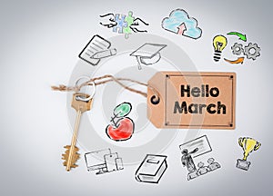 Hello March. Key and a note on a white background