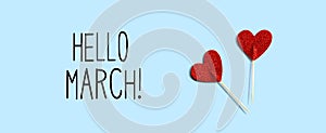 Hello March message with red glitter heart picks
