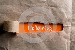 Hello may concept. Inscription in torn envelope. 1st May - Labor day