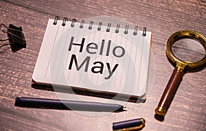 Hello May sign with sky background