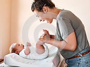 Hello my angel. a young woman bonding with her baby boy at home.