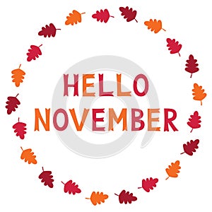 Hello November, card with autumn leaves, text in hand lettered font photo