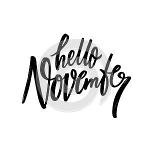 Hello November handwritten black color lettering phrase.