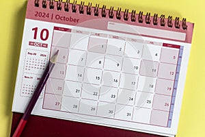 Hello October. Desk calendar for planning for October 2024.