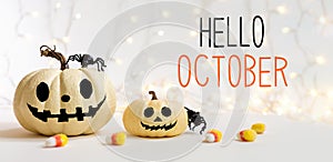 Hello October with halloween pumpkins with spider