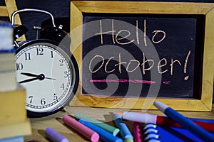 Hello october on phrase colorful handwritten on blackboard