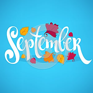 Hello September, bright fall leaves and lettering