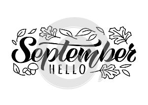 Hello September hand drawn lettering card with doodle leaves and mushrooms. Inspirational autumn quote.