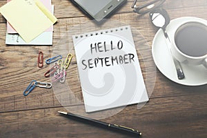 Hello september text on paper