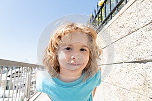 Hello summer. Portrait of happy child. Boy child. Childs face. Happy childhood and boyhood