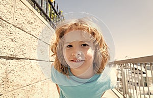 Hello summer. Portrait of happy child. Boy child. Childs face. Happy childhood and boyhood