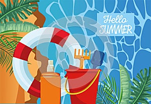 Hello summer seasonal scene with lifeguard float and sandbucket photo