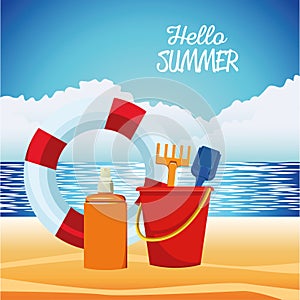 Hello summer seasonal scene with lifeguard float and sandbucket photo