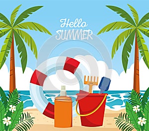 Hello summer seasonal scene with lifeguard float and sandbucket photo