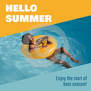 Hello summer text and african american woman with afro hair relaxing on inflatable swim ring in pool