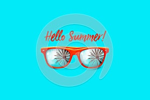 Hello Summer text Orange sunglasses with palm tree reflections isolated in large cyan background.
