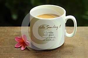 Hello Sunday greetings and quote on white mug of coffee - A Sunday well spent brings a week of content. Morning coffee. Sunday photo