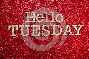 Hello Tuesday alphabet letter on red glitter background