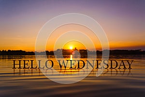 `HELLO WEDNESDAY ` with sunset water , twilight time