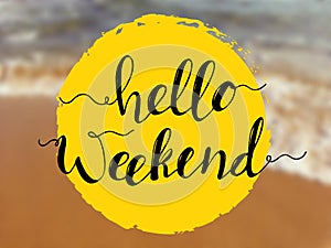 Hello weekend lettering on sea view. Inspirational quote on beach background photo