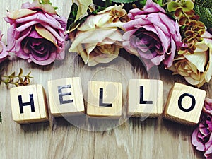 Hello word wooden block on wooden background