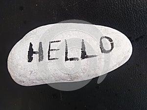 Hello written on a stone