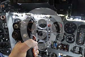 helm of military helicopter in the pilot's hand. fighter pilot. Inside attack aircraft