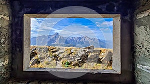 Helm - Scenic view from window of remains of military bunker of First World War, mount Helm (Monte Elmo)