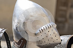 The helmet and armor of a medieval knight.