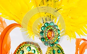 Helmet decorated with bright stones and feathers for carnival