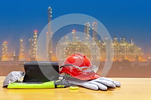 Helmet in industry site and Petrochemical oil refinery plant, site worker background safety first concept