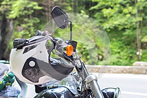 Helmet on the motorcycle handlebars