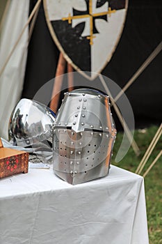 Helmet and shield of a knight`s armour at the Medieval Market