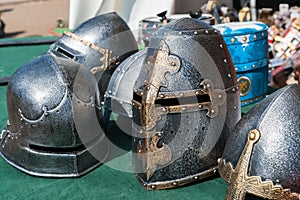 Helmets of knight armor on display for sale