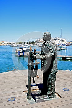 Helmsman statue, Vilamoura. photo