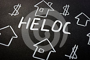 HELOC home equity line of credit loan and homes on the black sheet