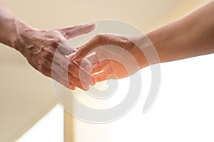 Help Concept Hands reaching out to help together