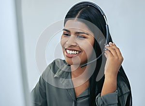 Help desk, phone call and Indian woman in office for customer service, telemarketing and headset at call center. Advisor