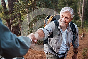 Help, holding hands and couple hiking in nature, climbing support and giving a hand. Happy, together and a person