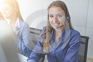 Help line answering and telemarketing. Female caller or receptionist phone operator. photo