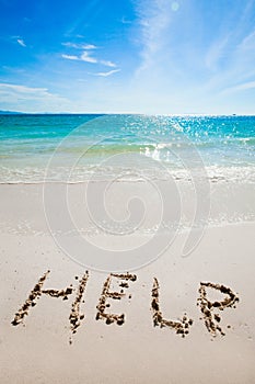 Help Sign on the beach