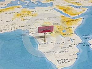 `HELP!` Sign with Pole on Angola of the World Map