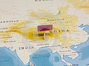 `HELP!` Sign with Pole on Bhutan of the World Map